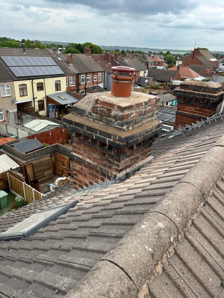 This is a photo taken from a roof which is being repaired by East Bridgford Roofing Repairs, it shows a street of houses, and their roofs